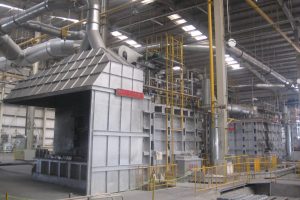 Refractory materials for aluminum smelting furnaces